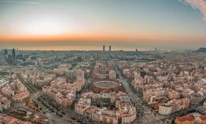 Framed Print : Aerial drone shot of Barcelona city before sunrise time Framed Print : Aerial drone shot of Barcelona city before sunrise time