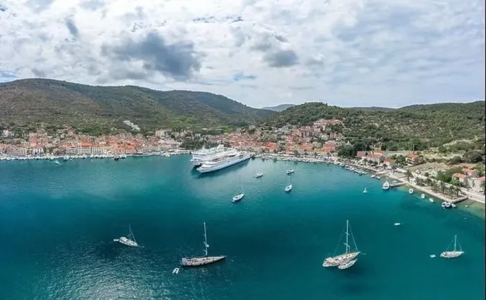 Framed Print : Aerial drone shot of cruise ferry at Adriatic sea port on Vis Island in Croatia summer Framed Print : Aerial drone shot of cruise ferry at Adriatic sea port on Vis Island in Croatia summer