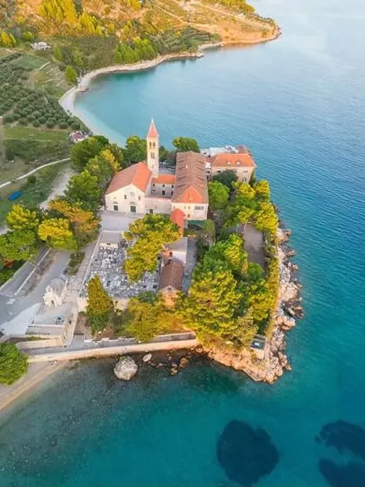 Framed Print : Aerial drone shot of the Dominican Monastery in Bol, Brač Island in Croatia Framed Print : Aerial drone shot of the Dominican Monastery in Bol, Brač Island in Croatia