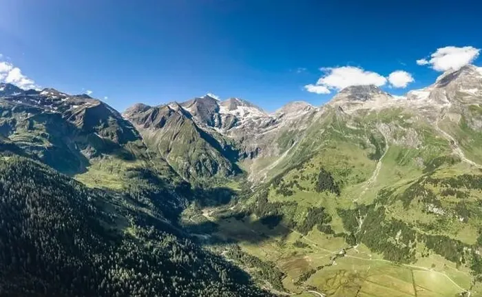 Framed Print : Aerial drone shot of Grossglockner mountain range valley in summer in Austria Framed Print : Aerial drone shot of Grossglockner mountain range valley in summer in Austria
