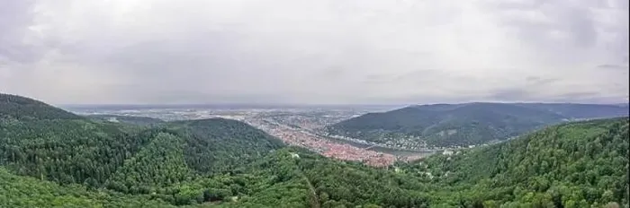 Framed Print : Aerial drone shot of Heidelberg from Konigstuhl hill in overcast summer morning Framed Print : Aerial drone shot of Heidelberg from Konigstuhl hill in overcast summer morning