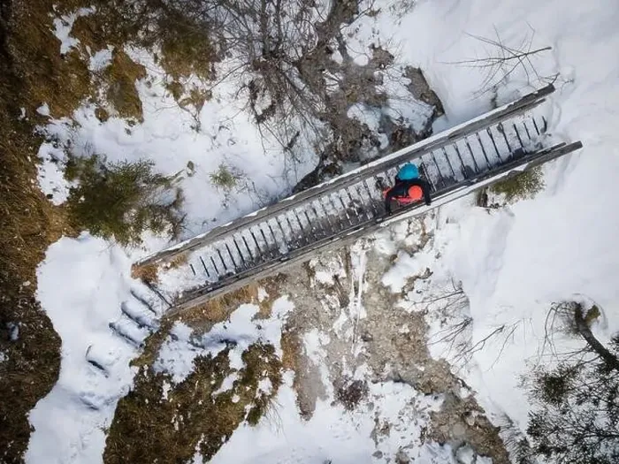 Framed Print : aerial drone shot of hiker with backpack Framed Print : aerial drone shot of hiker with backpack