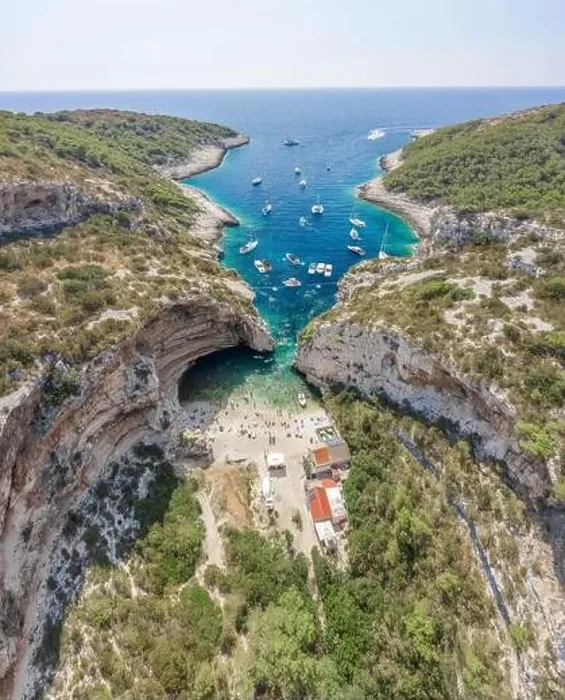 Framed Print : Aerial drone shot of iconic Stiniva cove beach of Adriatic sea on Vis Island in Croatia summer