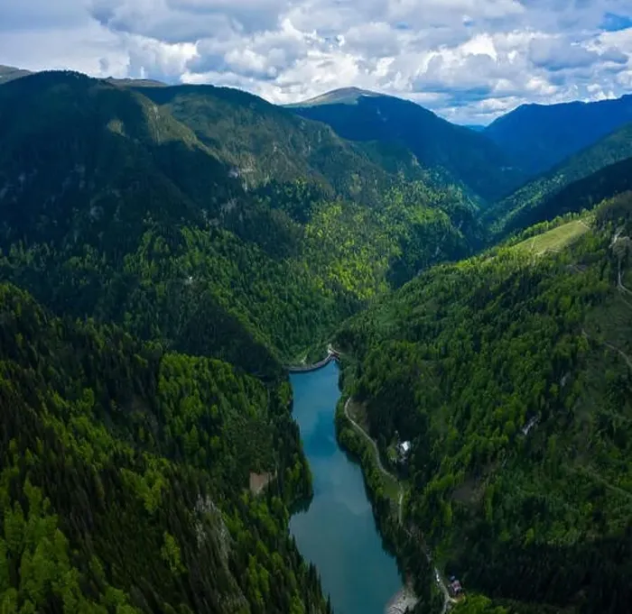 Framed Print : Aerial drone shot of a lake and green forest in Transylvania, Romania Framed Print : Aerial drone shot of a lake and green forest in Transylvania, Romania