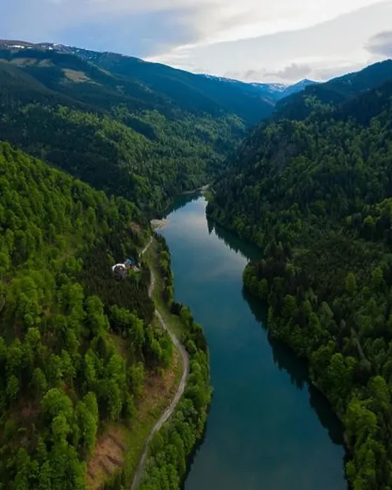 Framed Print : Aerial drone shot of a lake and green forest in Transylvania, Romania Framed Print : Aerial drone shot of a lake and green forest in Transylvania, Romania
