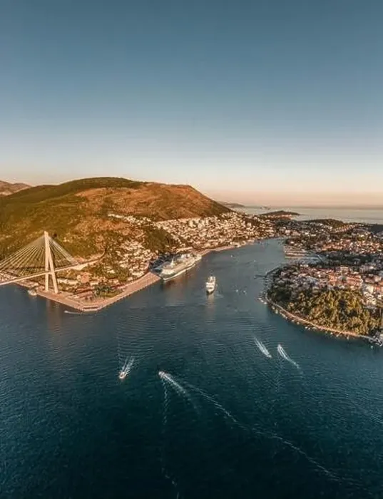 Framed Print : Aerial drone shot of Lapad Gruz peninsula area with Dubrovnik bridge cruise ship in Croatia summer sunset