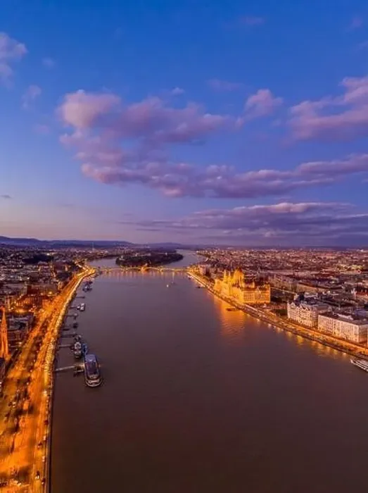 Framed Print : Aerial drone shot of lighted Hungarian Parliament by Danube river in purple Budapest sunset hour Framed Print : Aerial drone shot of lighted Hungarian Parliament by Danube river in purple Budapest sunset hour