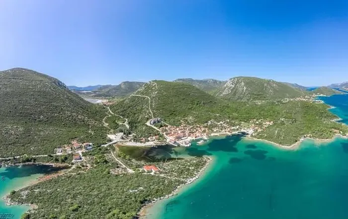 Framed Print : Aerial drone shot of Mali Ston village with City Wall of Ston in Ragusa near Dubrovnik in Croatia summer Framed Print : Aerial drone shot of Mali Ston village with City Wall of Ston in Ragusa near Dubrovnik in Croatia summer
