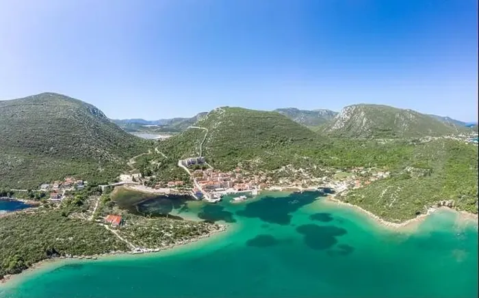 Framed Print : Aerial drone shot of Mali Ston village with City Wall of Ston in Ragusa near Dubrovnik in Croatia summer Framed Print : Aerial drone shot of Mali Ston village with City Wall of Ston in Ragusa near Dubrovnik in Croatia summer