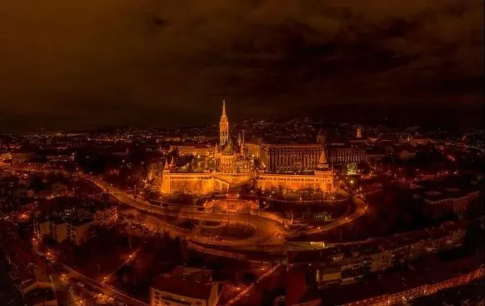Framed Print : Aerial drone shot of Matthias Church with lights on Buda Hill in Budapest evening Framed Print : Aerial drone shot of Matthias Church with lights on Buda Hill in Budapest evening