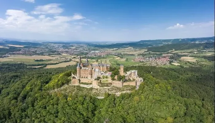 Framed Print : Aerial drone shot of Medival Hohenzollern Castle on hill near Stuttgart at summer noon Framed Print : Aerial drone shot of Medival Hohenzollern Castle on hill near Stuttgart at summer noon