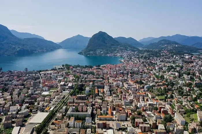 Framed Print : Aerial drone shot of monte salvatore, lugano city and lake in sunny day Framed Print : Aerial drone shot of monte salvatore, lugano city and lake in sunny day