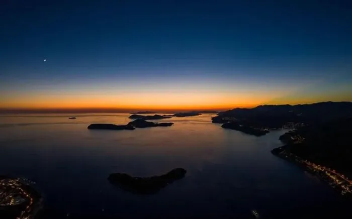 Framed Print : Aerial drone shot of post sunset over Adriatic sea view from Babin Kuk hill in Dubrovnik Croatia summer Framed Print : Aerial drone shot of post sunset over Adriatic sea view from Babin Kuk hill in Dubrovnik Croatia summer