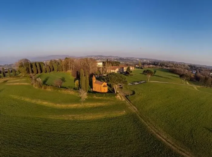 Framed Print : Aerial drone shot. Red church of Pomelasca at sunset - Lombardy countryside panorama, Inverigo, province of Como, Italy Framed Print : Aerial drone shot. Red church of Pomelasca at sunset - Lombardy countryside panorama, Inverigo, province of Como, Italy