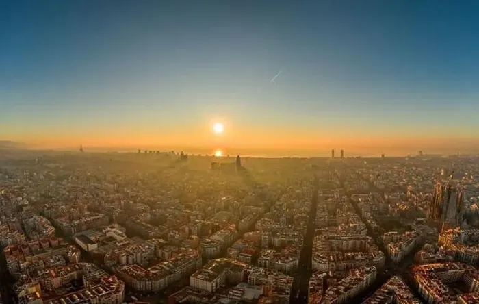 Framed Print : Aerial drone shot of rising sun over Barcelona city beach Framed Print : Aerial drone shot of rising sun over Barcelona city beach