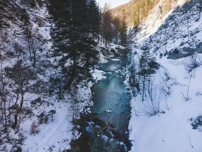 Framed Print : Aerial drone shot of snowy and icy winter landscape in the oetschergraeben Framed Print : Aerial drone shot of snowy and icy winter landscape in the oetschergraeben