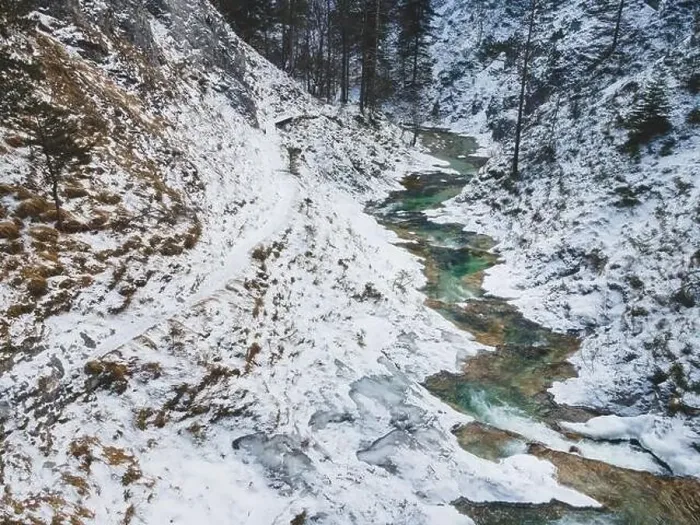 Framed Print : Aerial drone shot of snowy and icy winter landscape in the oetschergraeben Framed Print : Aerial drone shot of snowy and icy winter landscape in the oetschergraeben