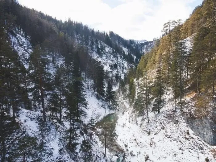 Framed Print : Aerial drone shot of snowy and icy winter landscape in the oetschergraeben Framed Print : Aerial drone shot of snowy and icy winter landscape in the oetschergraeben