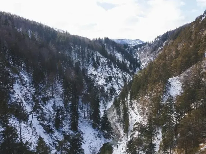 Framed Print : Aerial drone shot of snowy and icy winter landscape in the oetschergraeben Framed Print : Aerial drone shot of snowy and icy winter landscape in the oetschergraeben