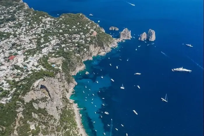 Framed Print : Aerial drone shot of south Capri coastline with faraglioni crag with luxury yachts in Tyrrhenian sea Framed Print : Aerial drone shot of south Capri coastline with faraglioni crag with luxury yachts in Tyrrhenian sea