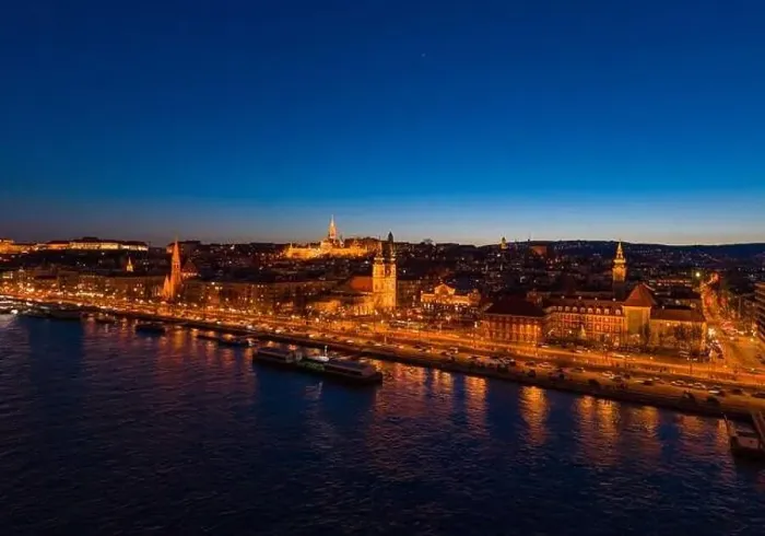 Framed Print : Aerial drone shot of St. Anne Parish church by Danube river at Budapest dusk city lights on Framed Print : Aerial drone shot of St. Anne Parish church by Danube river at Budapest dusk city lights on