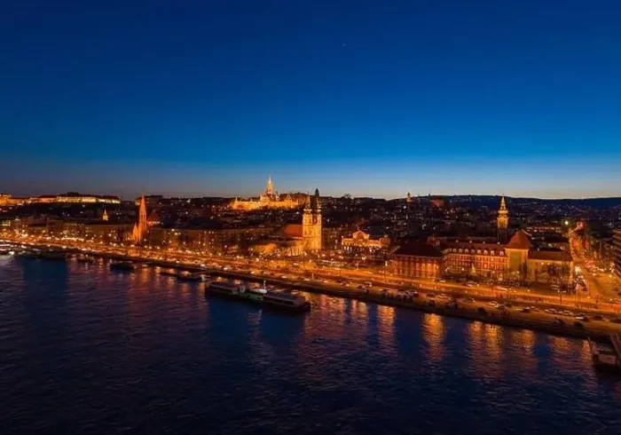 Framed Print : Aerial drone shot of St. Anne Parish church by Danube river at Budapest dusk city lights on Framed Print : Aerial drone shot of St. Anne Parish church by Danube river at Budapest dusk city lights on