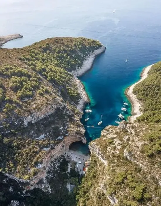 Framed Print : Aerial drone shot of Stiniva cove beach of Adriatic sea on Vis Island in Croatia summer Framed Print : Aerial drone shot of Stiniva cove beach of Adriatic sea on Vis Island in Croatia summer