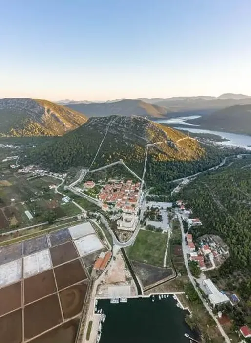 Framed Print : Aerial drone shot of Ston city wall over hill in Ragusa region near Dubrovnik in Croatia summer sunrise Framed Print : Aerial drone shot of Ston city wall over hill in Ragusa region near Dubrovnik in Croatia summer sunrise