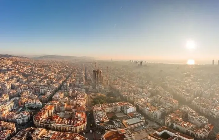 Framed Print : Aerial drone shot of sunrise over Barcelona city center in early morning Framed Print : Aerial drone shot of sunrise over Barcelona city center in early morning
