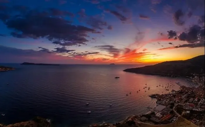 Framed Print : Aerial drone shot of sunset burning sky clouds on Komiza town over Vis Island in Croatia Summer Framed Print : Aerial drone shot of sunset burning sky clouds on Komiza town over Vis Island in Croatia Summer