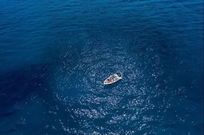 Framed Print : Aerial drone shot view of a boat in Ionian sea near Zakynthos Island