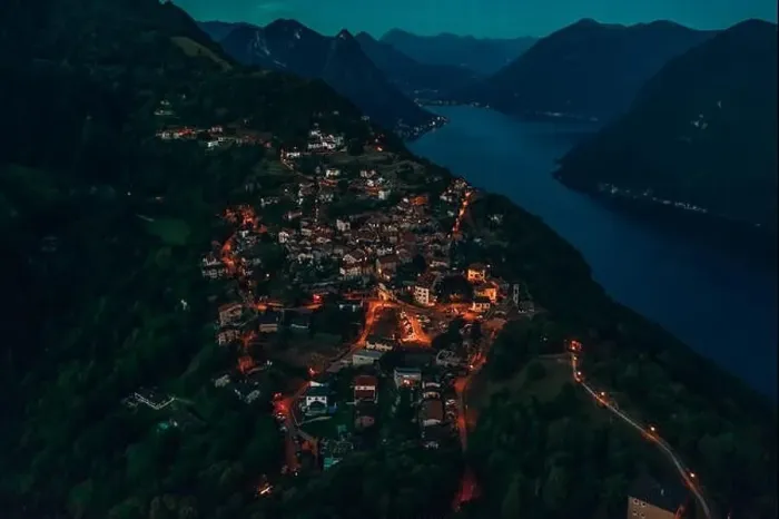 Framed Print : Aerial drone shot view of Bre Sopra, swiss village on Monte Bre in Lugano, Switzerland Framed Print : Aerial drone shot view of Bre Sopra, swiss village on Monte Bre in Lugano, Switzerland