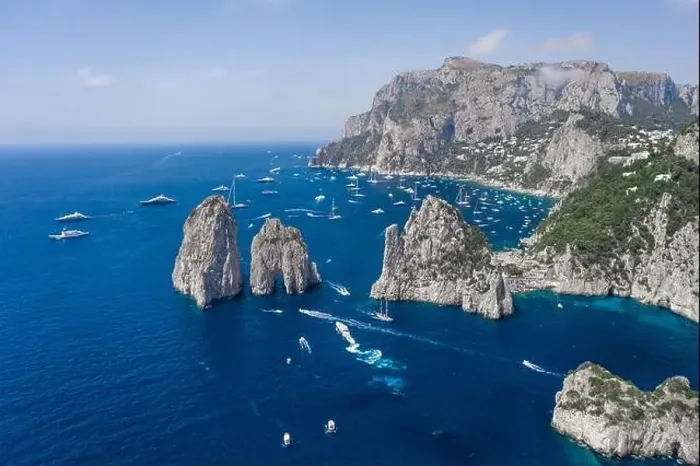 Framed Print : Aerial drone shot view of Faraglioni from east Capri Island in Tyrrhenian sea with Luxury yachts Framed Print : Aerial drone shot view of Faraglioni from east Capri Island in Tyrrhenian sea with Luxury yachts