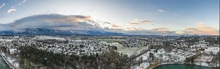 Framed Print : Aerial drone shot view of outskirts and austrian alps untersberg with heavy fog in winter Framed Print : Aerial drone shot view of outskirts and austrian alps untersberg with heavy fog in winter