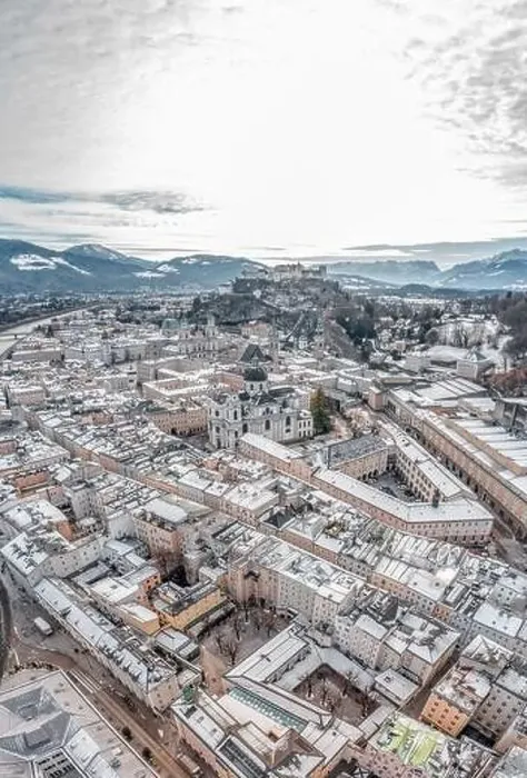 Framed Print : Aerial drone shot view of snowy salzburg city center with view of Cathdrals and fortress in winter Framed Print : Aerial drone shot view of snowy salzburg city center with view of Cathdrals and fortress in winter