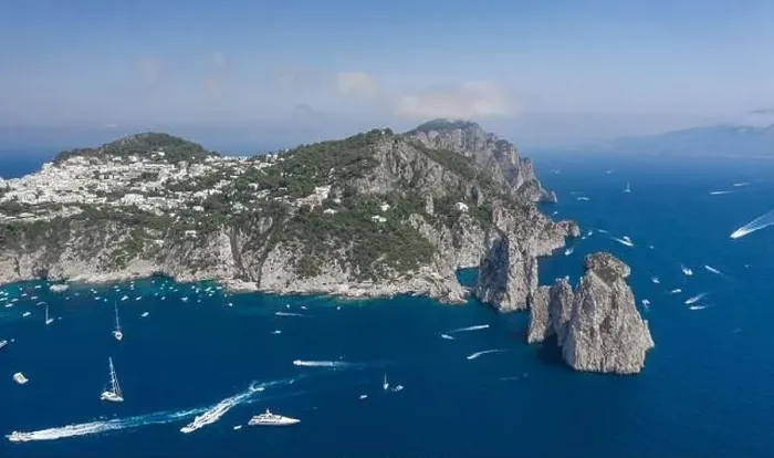 Framed Print : Aerial drone shot view of southern coastline of Capri Islan in Tyrrhenian sea with yachts Framed Print : Aerial drone shot view of southern coastline of Capri Islan in Tyrrhenian sea with yachts