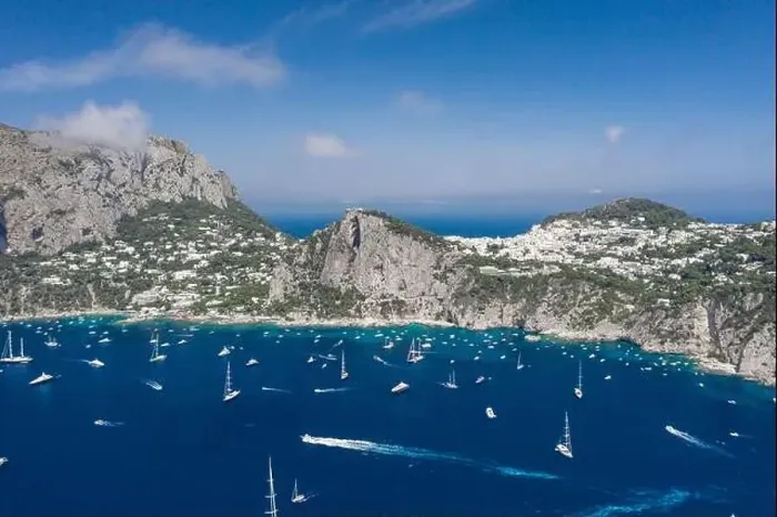 Framed Print : Aerial drone shot view of southern coastline of Capri Islan in Tyrrhenian sea with yachts Framed Print : Aerial drone shot view of southern coastline of Capri Islan in Tyrrhenian sea with yachts