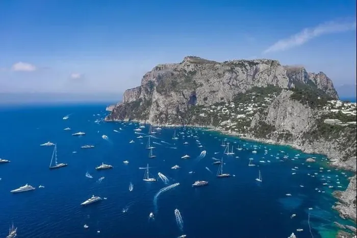 Framed Print : Aerial drone shot view of southern coastline of Capri Islan in Tyrrhenian sea with yachts Framed Print : Aerial drone shot view of southern coastline of Capri Islan in Tyrrhenian sea with yachts
