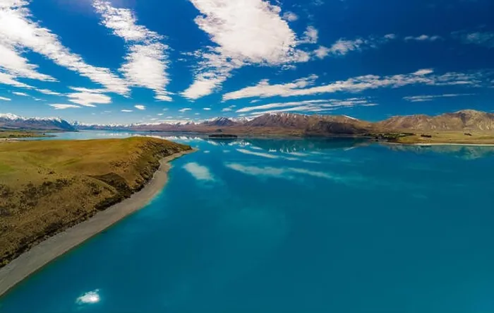 Framed Print : Aerial drone shots of beautiful Lake Tekapo with reflection of sky and mountains, New Zealand Framed Print : Aerial drone shots of beautiful Lake Tekapo with reflection of sky and mountains, New Zealand