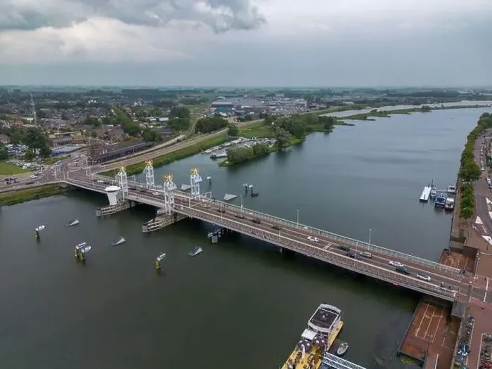 Framed Print : Aerial drone video of the bridge over the river Ijssel in Kampen. Kampen is a city in Overijssel, the Netherlands Framed Print : Aerial drone video of the bridge over the river Ijssel in Kampen. Kampen is a city in Overijssel, the Netherlands