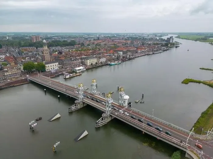 Framed Print : Aerial drone video of the bridge over the river Ijssel in Kampen. Kampen is a city in Overijssel, the Netherlands Framed Print : Aerial drone video of the bridge over the river Ijssel in Kampen. Kampen is a city in Overijssel, the Netherlands