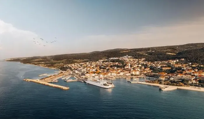 Framed Print : Aerial drone view of Adriatic island at sunset. The town of Supetar on Brach island at dawn.Tourist destination Europe Framed Print : Aerial drone view of Adriatic island at sunset. The town of Supetar on Brach island at dawn.Tourist destination Europe