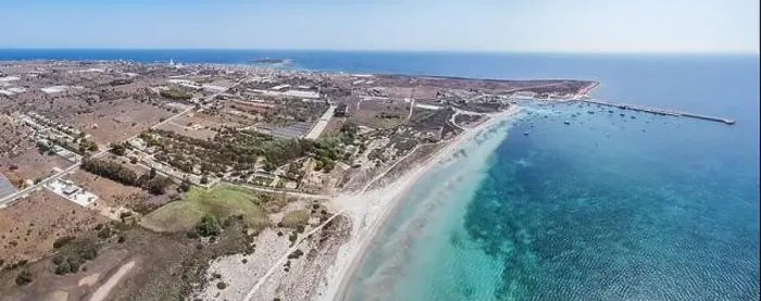 Framed Print : Aerial drone view of the beach and harbour of Portopalo di Capo Passero Framed Print : Aerial drone view of the beach and harbour of Portopalo di Capo Passero