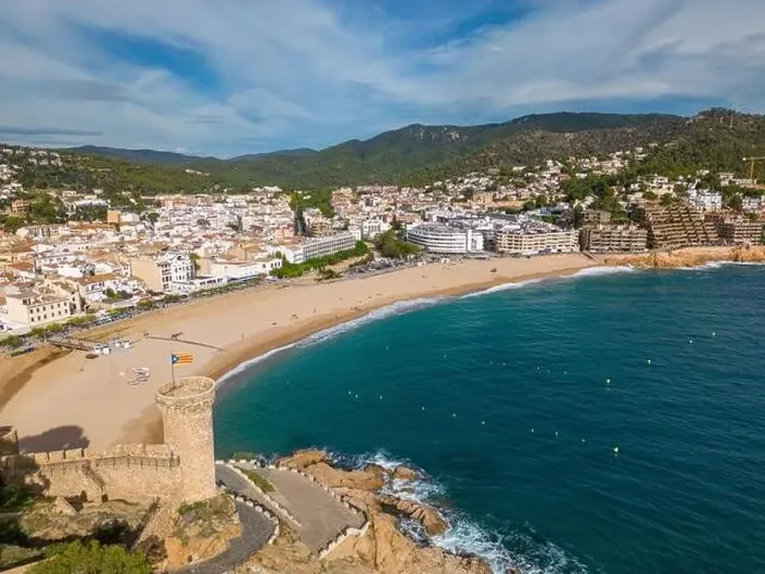 Framed Print : Aerial drone view of the coastal town named Tossa de Mar with a beach and castle Framed Print : Aerial drone view of the coastal town named Tossa de Mar with a beach and castle