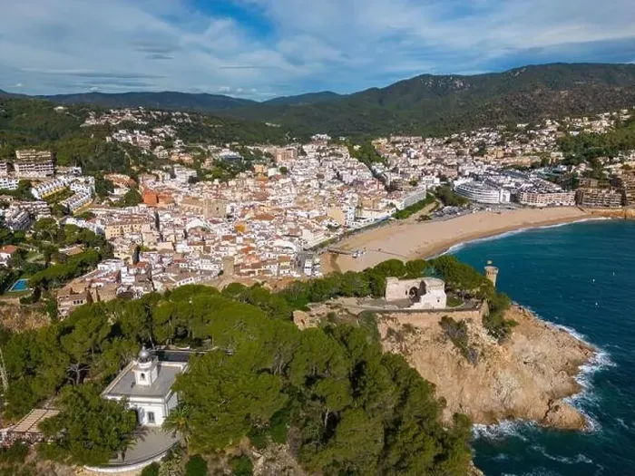 Framed Print : Aerial drone view of the coastal town named Tossa de Mar with a beach and castle Framed Print : Aerial drone view of the coastal town named Tossa de Mar with a beach and castle
