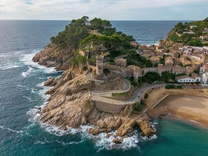 Framed Print : Aerial drone view of the coastal town named Tossa de Mar with a beach and castle Framed Print : Aerial drone view of the coastal town named Tossa de Mar with a beach and castle