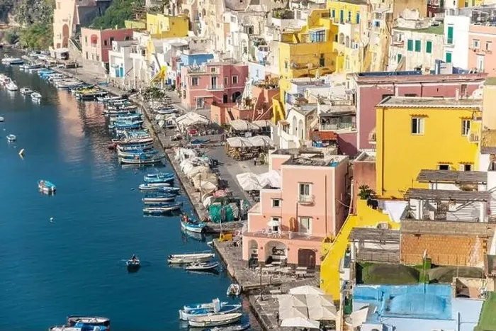 Framed Print : Aerial drone view of Corricella fisherman village in Procida island Naples Italy Framed Print : Aerial drone view of Corricella fisherman village in Procida island Naples Italy