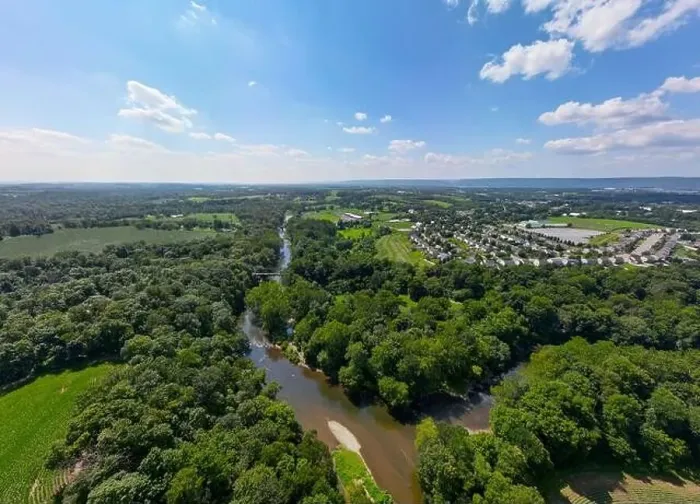 Framed Print : Aerial drone view of creek during daytime Framed Print : Aerial drone view of creek during daytime