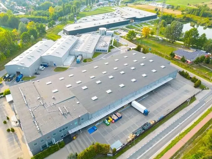 Framed Print : Aerial drone view on distribution center. Logistic and transport concept Framed Print : Aerial drone view on distribution center. Logistic and transport concept