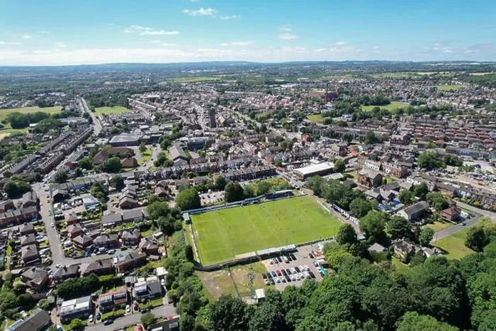 Framed Print : Aerial drone top view of football soccer field with people playing Framed Print : Aerial drone top view of football soccer field with people playing